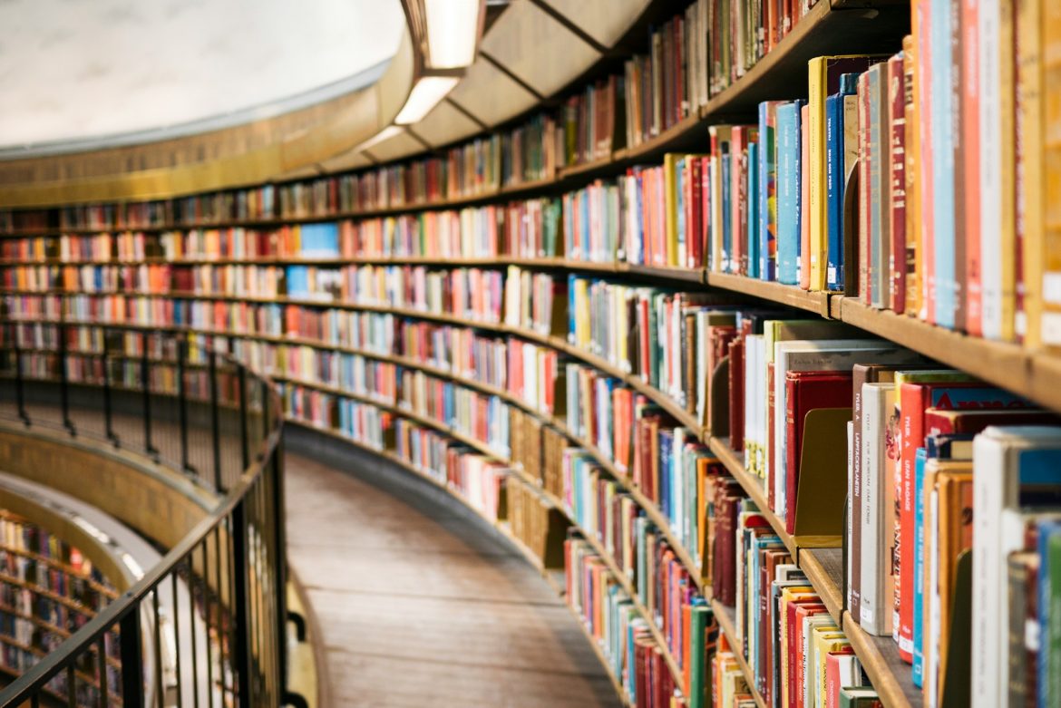A round shelf library with many educational books